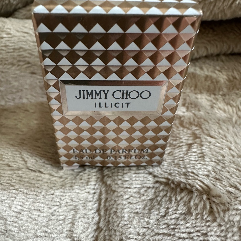 Jimmy Choo Illicit Perfume in Gold and White